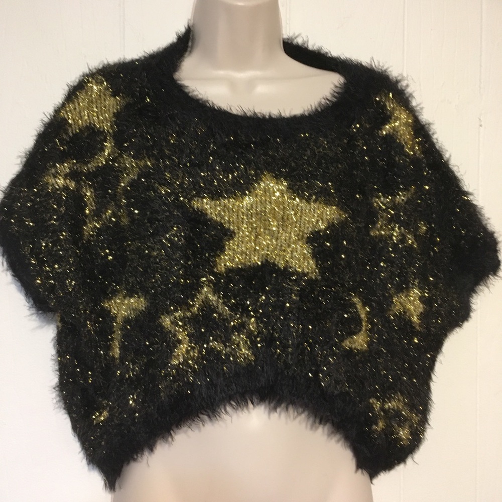 36 point 5  NWOT black/gold   sweater
